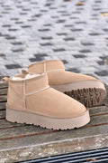 Botas beige bajas de cuero forradas con plataforma