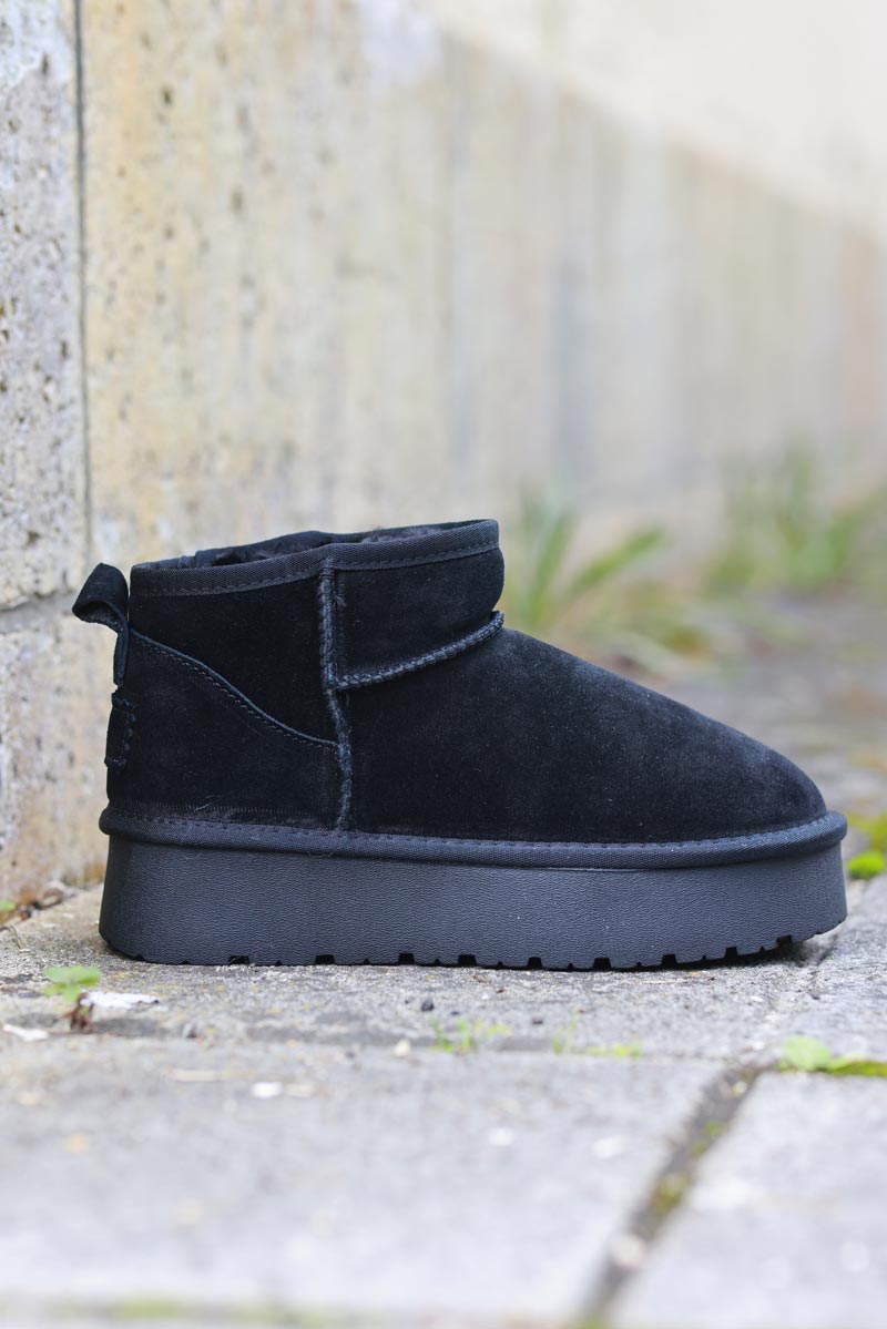 Botas negras bajas de cuero afelpado forradas con plataforma